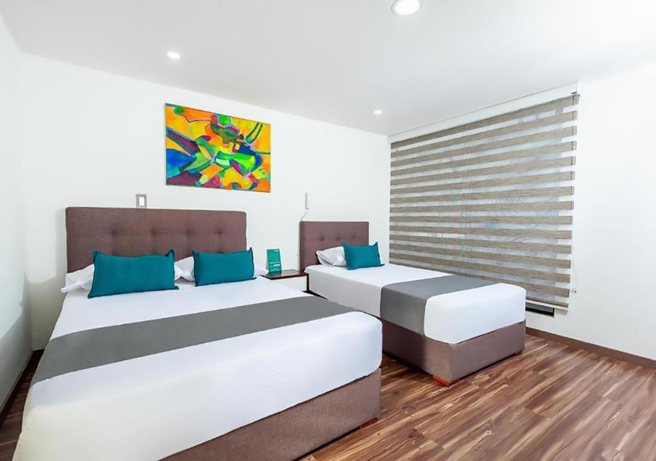 Hotel Basan Plaza Пасто Екстериор снимка