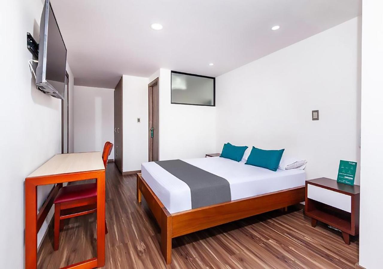Hotel Basan Plaza Пасто Екстериор снимка